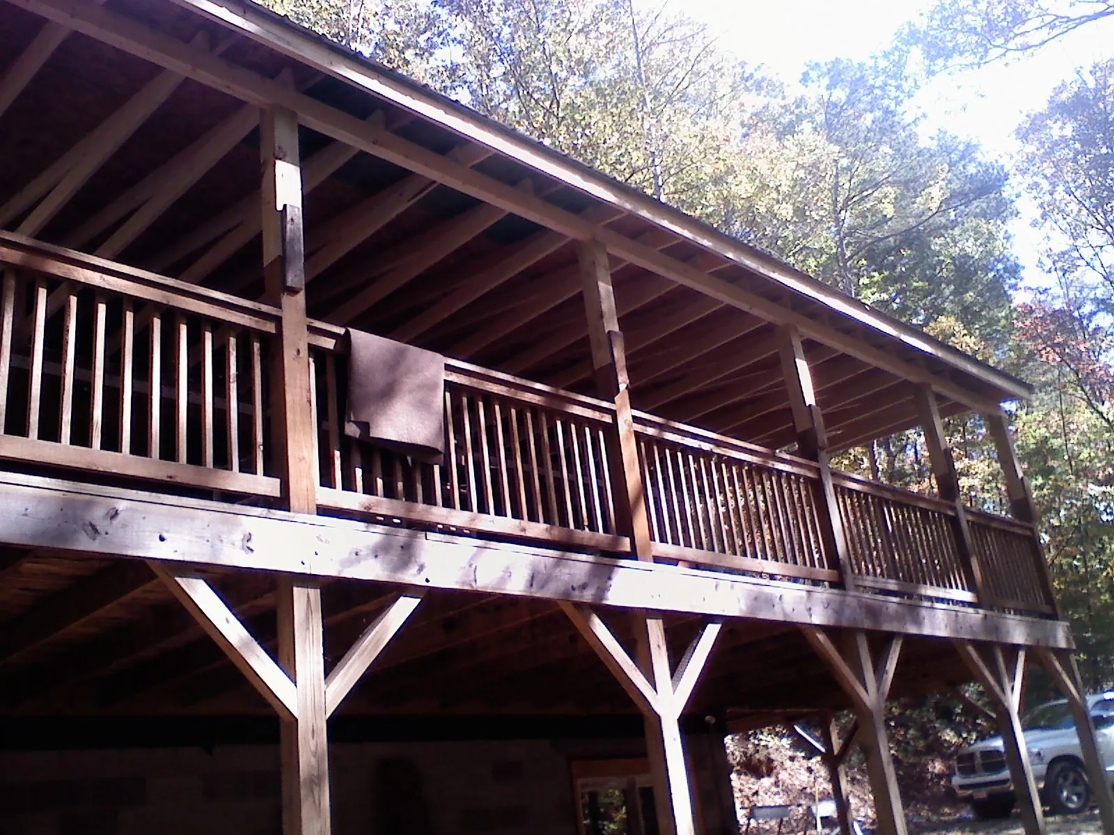 Timber framing under a new elevated porch and deck — Roof Leak Repair in Hungry Horse by Roofing Brothers